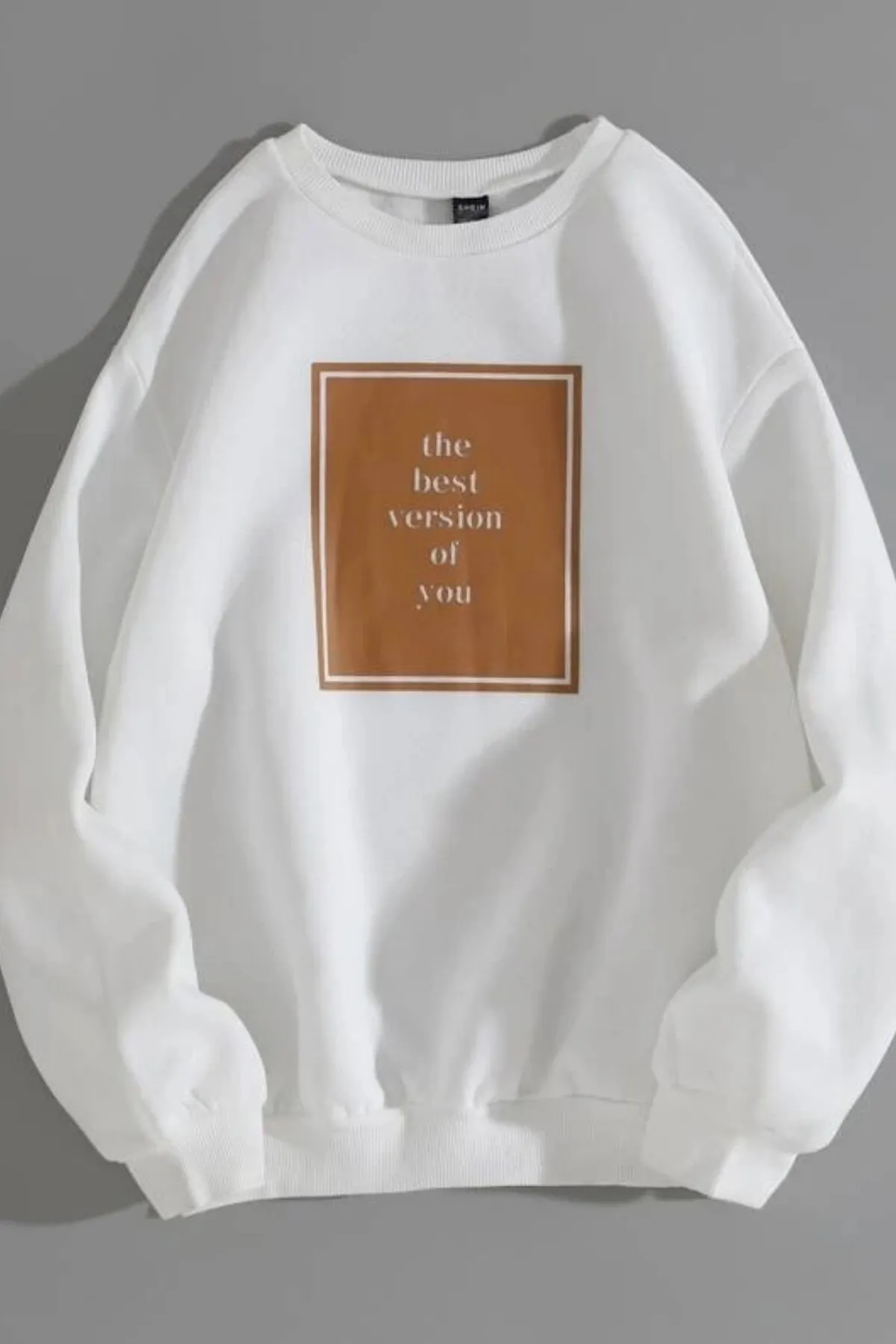 MODAGEN  Unisex-Sweatshirt „The Best“ in Weiß mit Rundhalsausschnitt