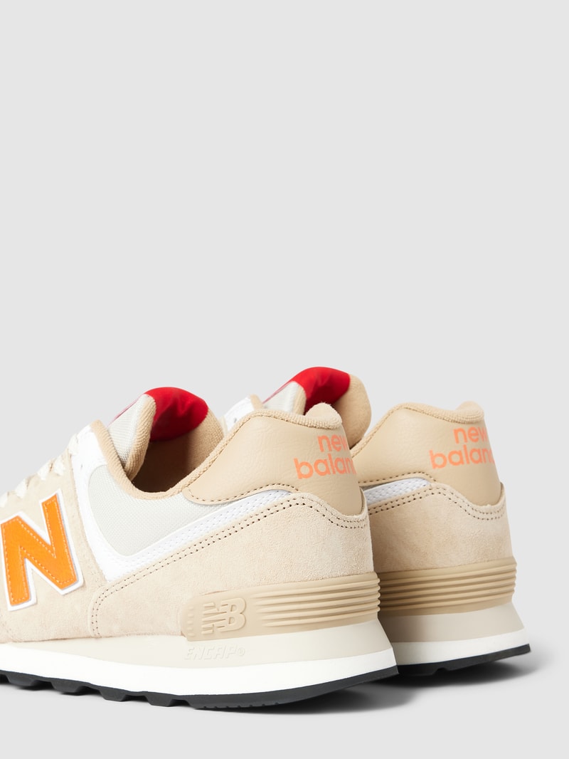 Sneaker mit Kontrastbesatz in orange