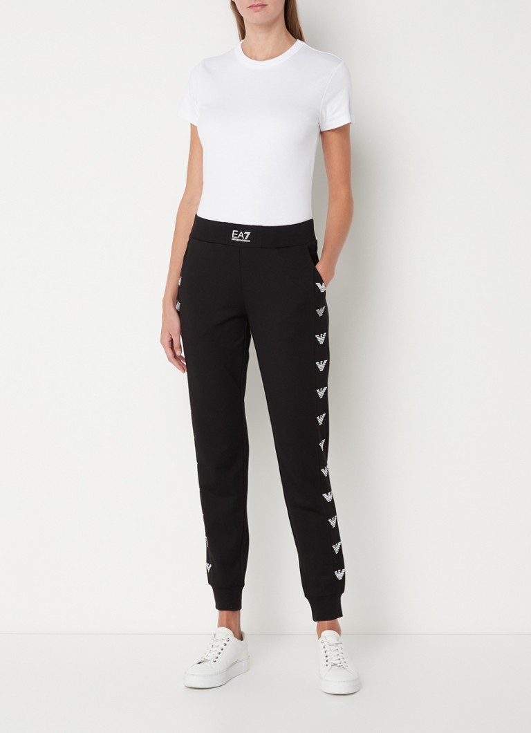 Pantaloni sportivi a vita alta e gamba affusolata di Emporio Armani con stampa logo.