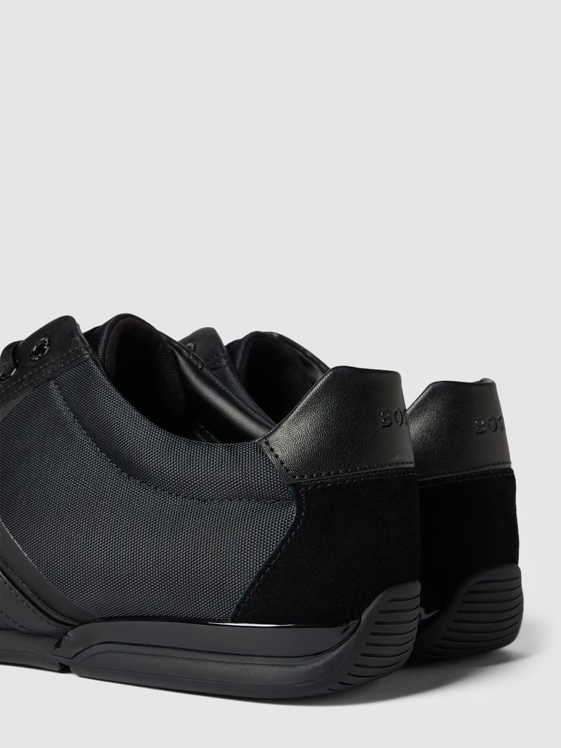 Sneaker aus Leder-Mix in schwarz