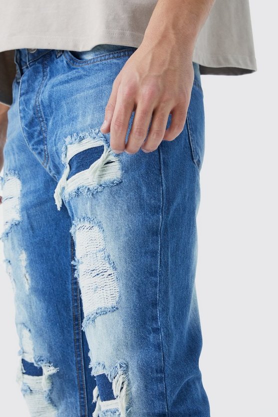 Gebleichte Slim-Fit Schlagjeans mit Rissen