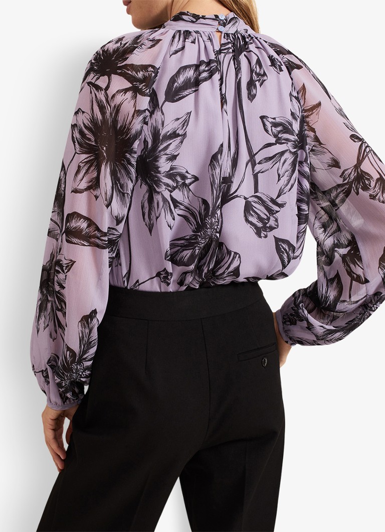 Tunică Aretta Phase Eight cu imprimeu floral și fundă la gât.