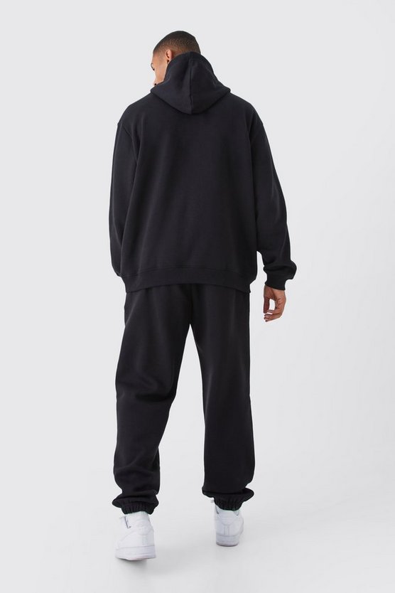 Oversize Trainingsanzug mit Homme Eyes Print und Kapuze