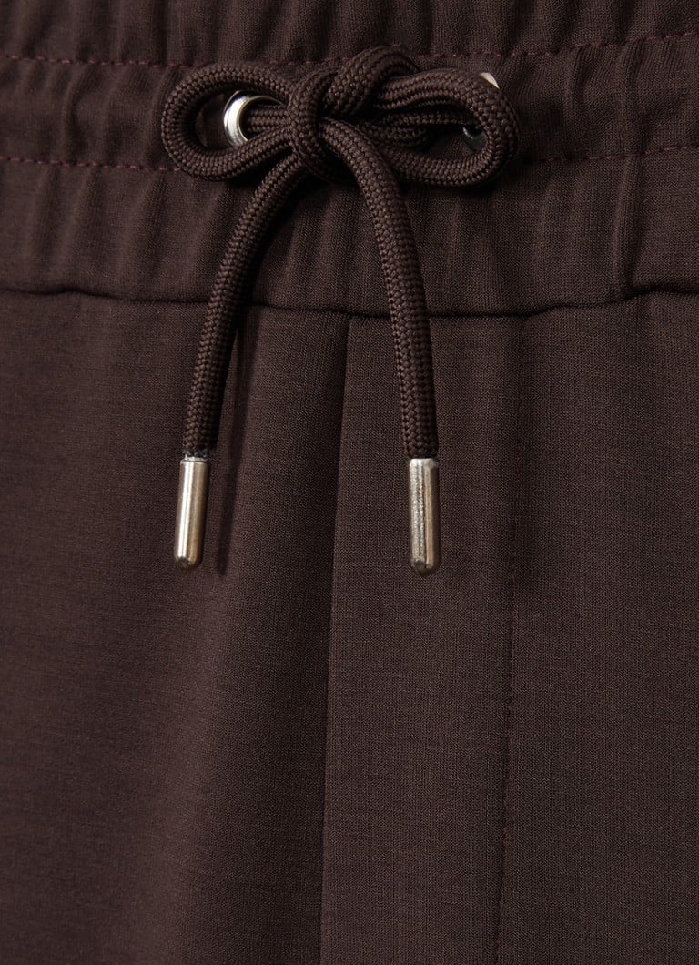 Pantaloni de trening conici Reiss Premier cu buzunare cusute.