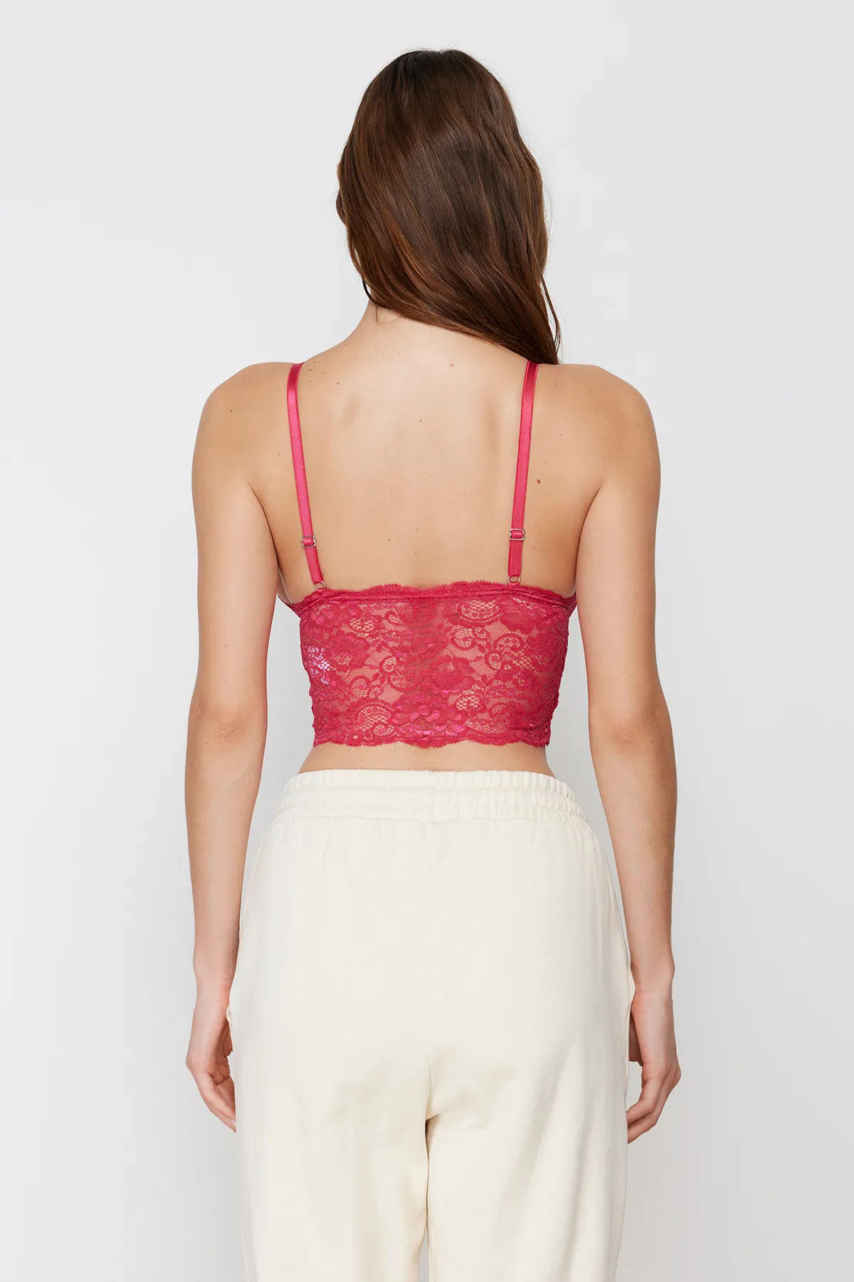 Trendyol Collection  Rosa gerüschtes dreieckiges Strick-Bustier mit Paspelierung und Riemen THMAW21SU0050