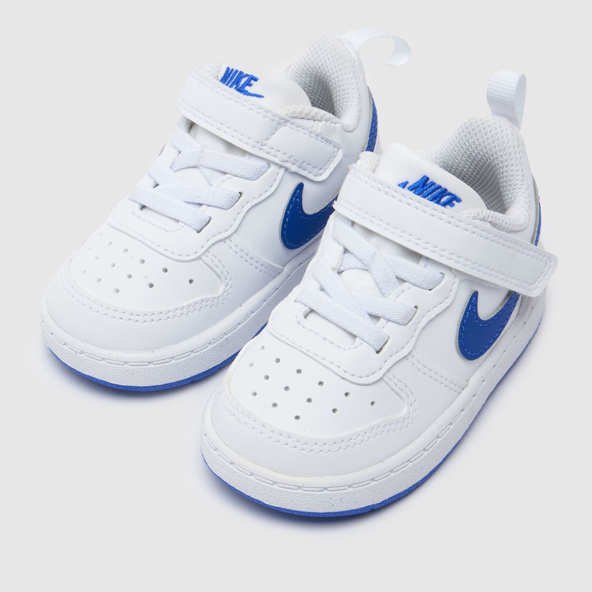 Bílo-tmavomodré nízké tenisky Nike Court Borough pro chlapce a batolata