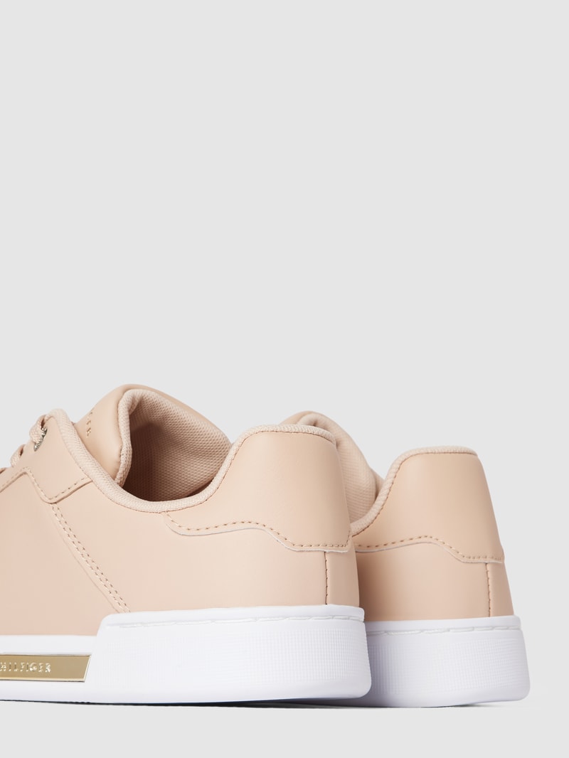 Sneaker mit Label-Details in metallic in hellrosa