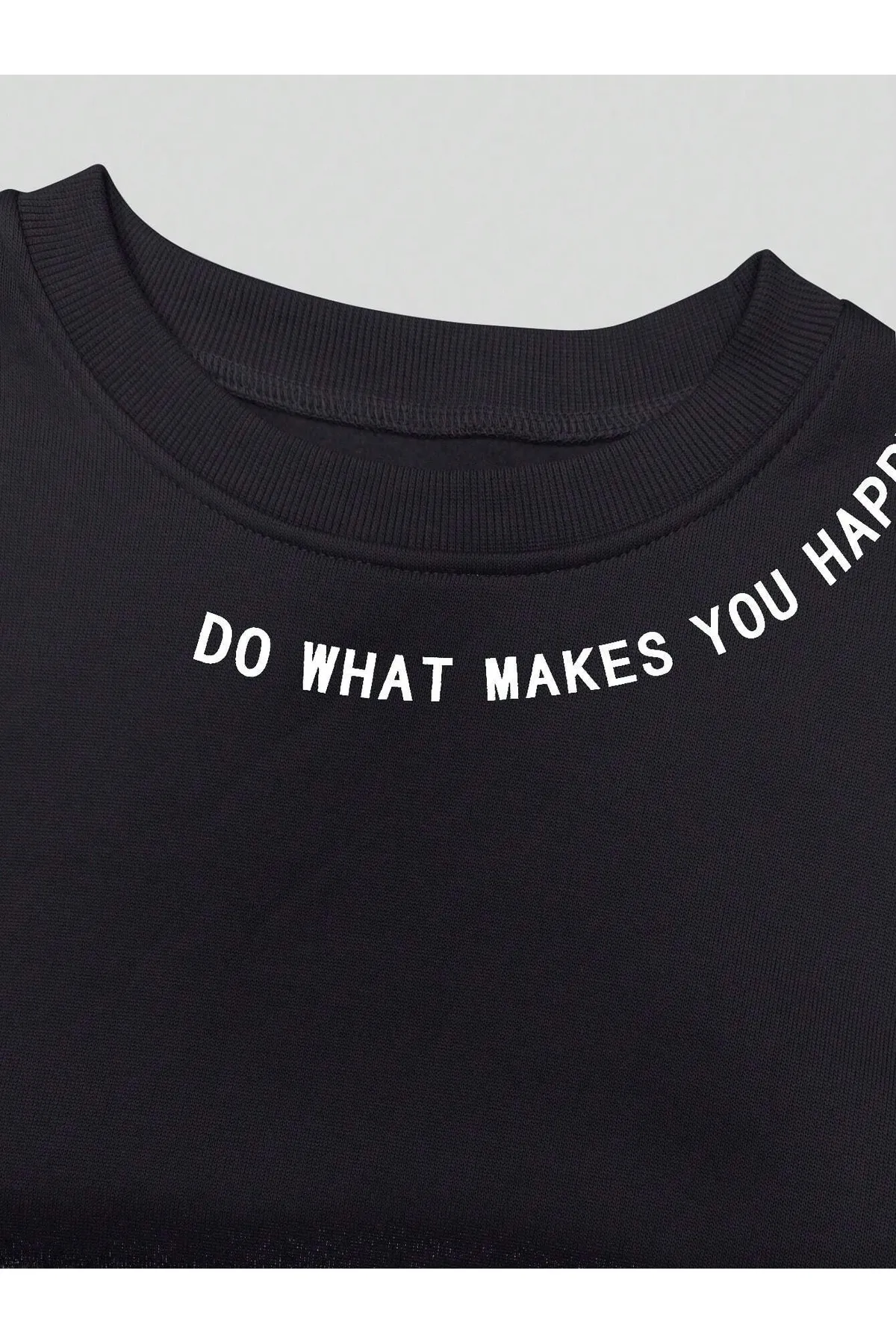 Know  Schwarzes Oversize-Sweatshirt mit Rundhalsausschnitt und „Do What Makes“-Aufdruck für Damen