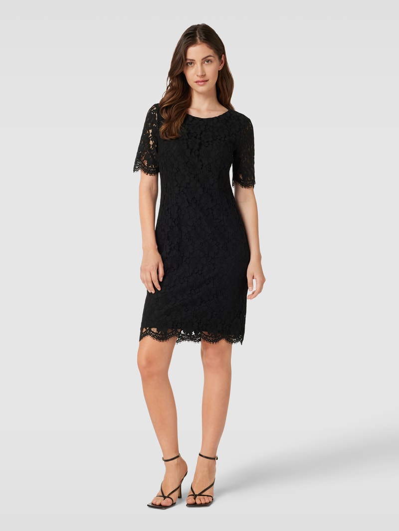 Knielanges Kleid mit Lochmuster in schwarz