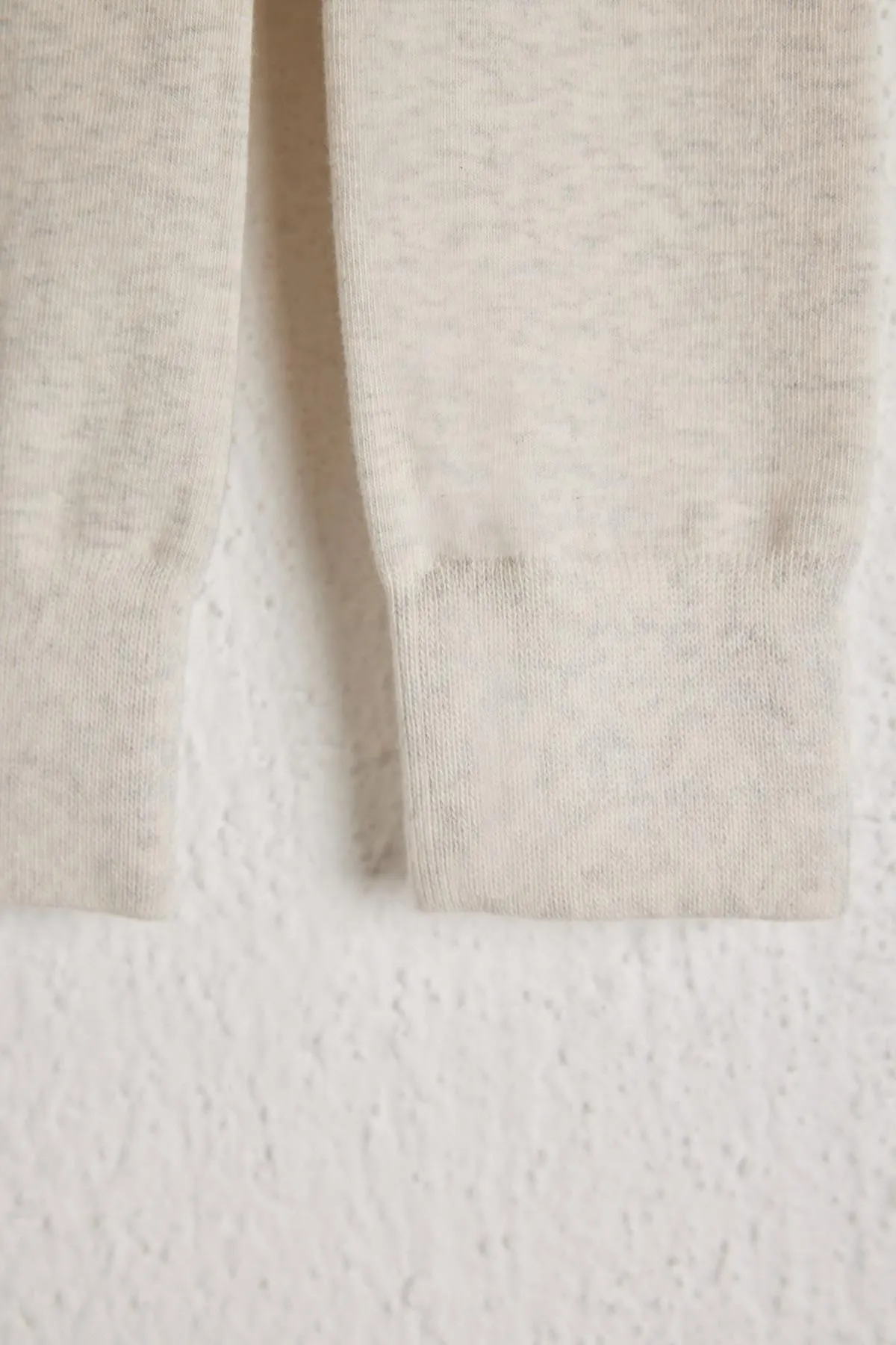 Katia&Bony  Gummi-Babystrumpfhose mit Details in Ecru