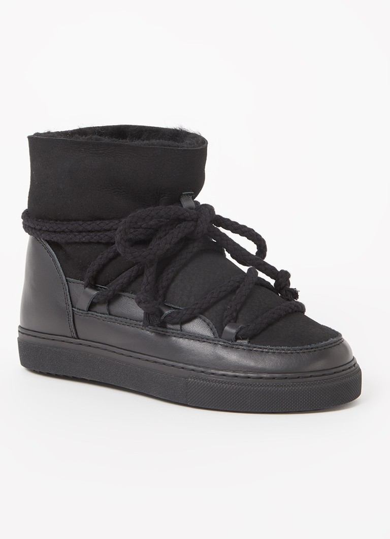 Bota de neve Inuikii Classic em pele de carneiro com detalhes em couro
