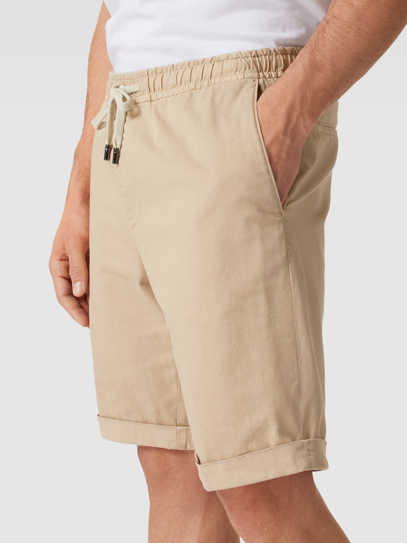 Shorts mit seitlichen Eingrifftaschen in schlamm