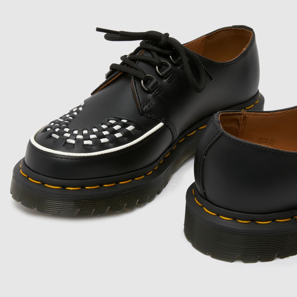 Črni ravni čevlji Dr. Martens Ramsey Creeper