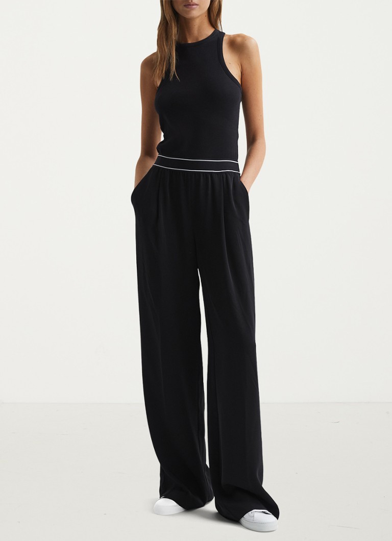 Pantaloni Reiss Abigail cu talie înaltă, cu croi larg și buzunare laterale.