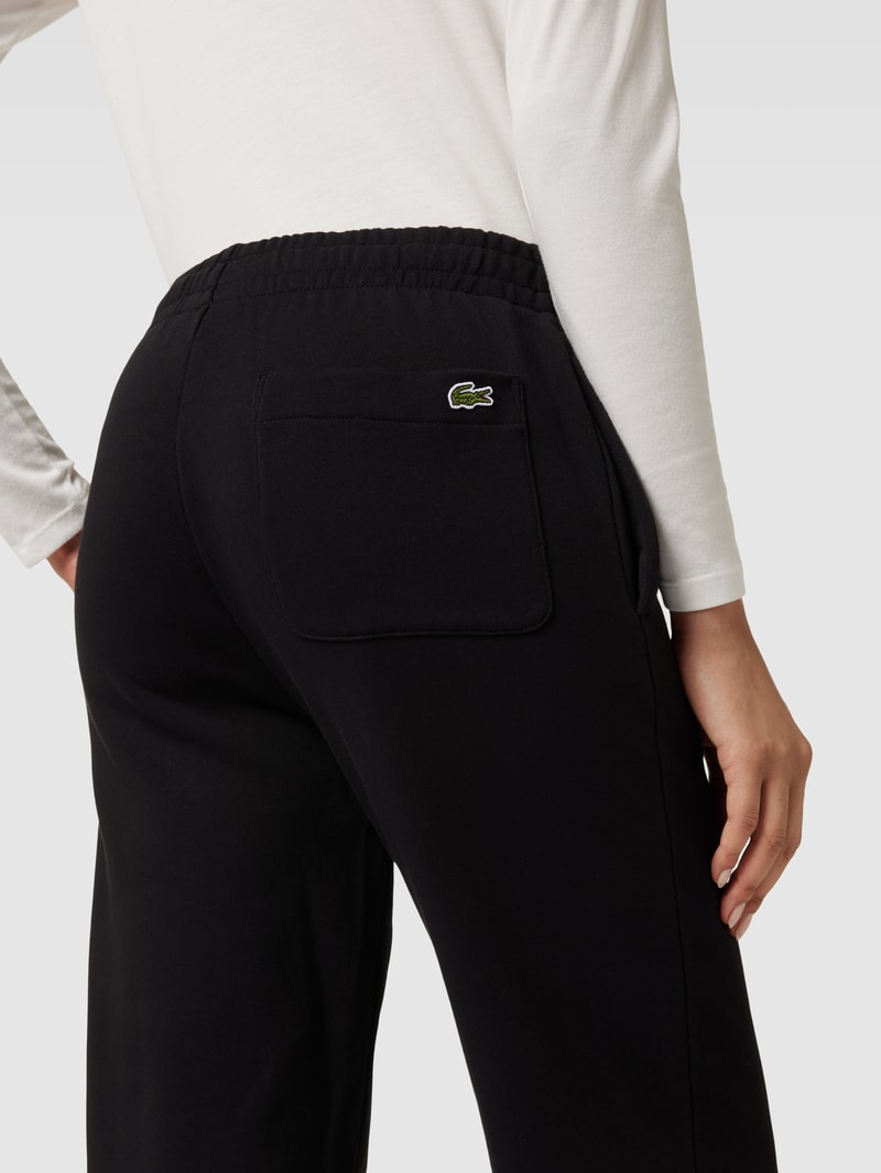 Sweatpants mit Label-Print in schwarz