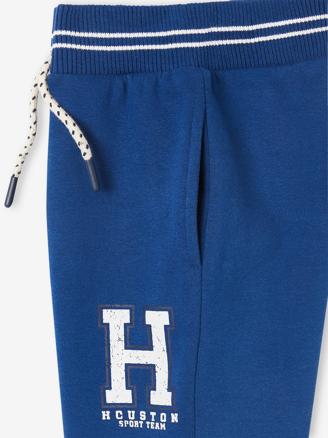 Pantalon jogging sport en molleton garçon. bleu électrique