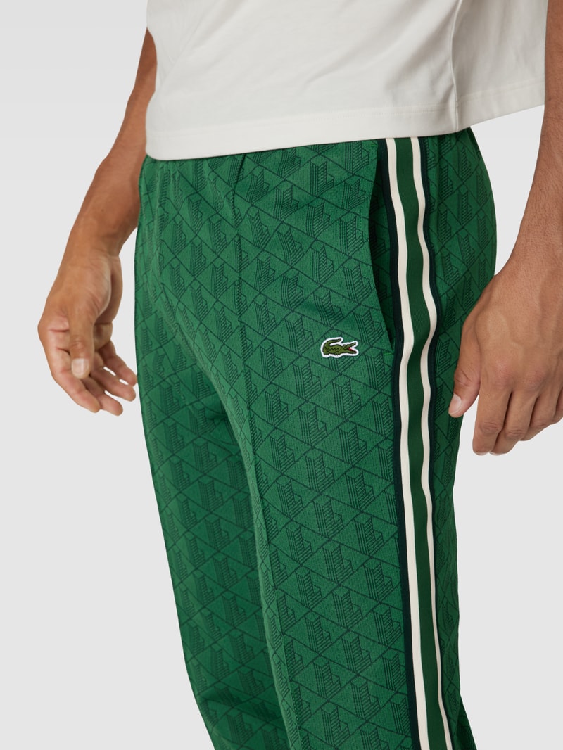 Sweatpants mit Allover-Muster in grün