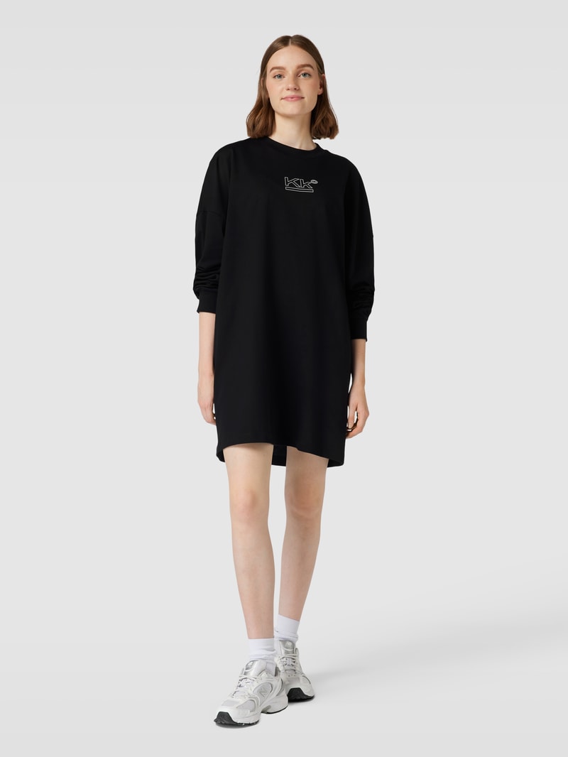Sweatkleid mit überschnittenen Schultern in schwarz