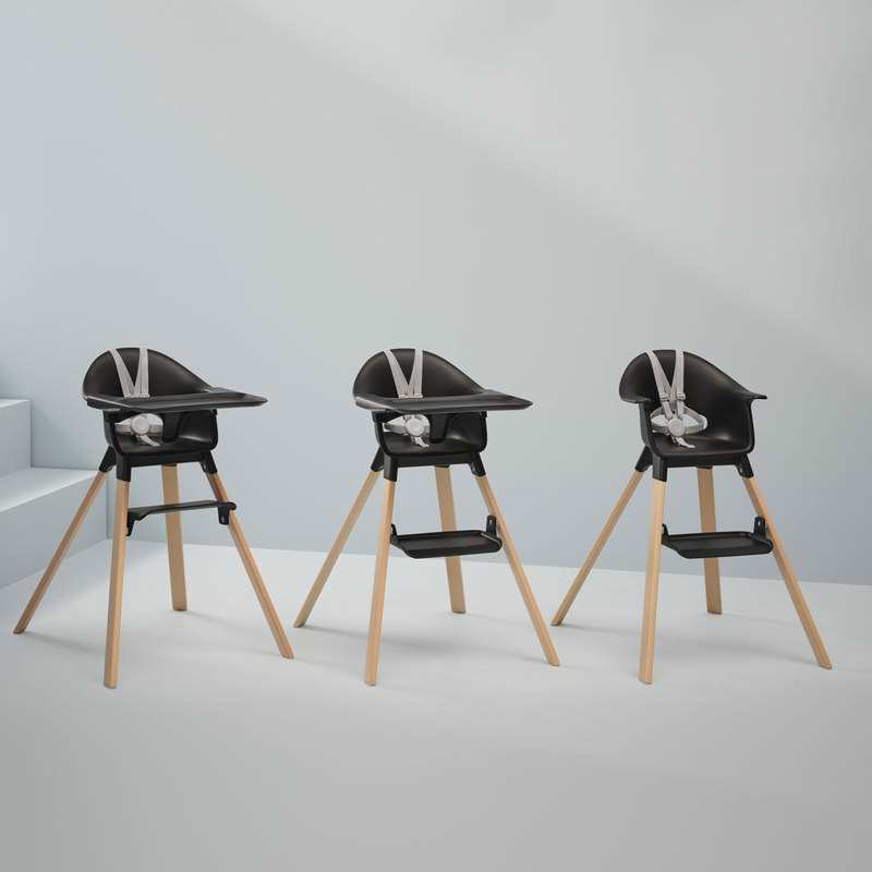 Chaise haute Clikk noire pieds bois Stokke