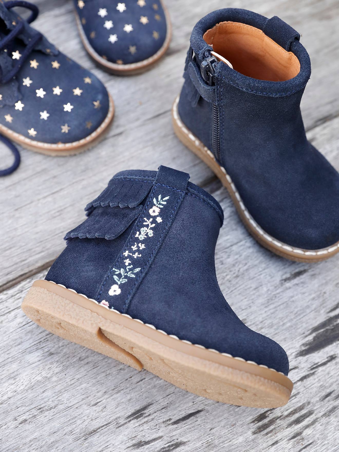 Boots cuir bébé fille frangées bleu marine
