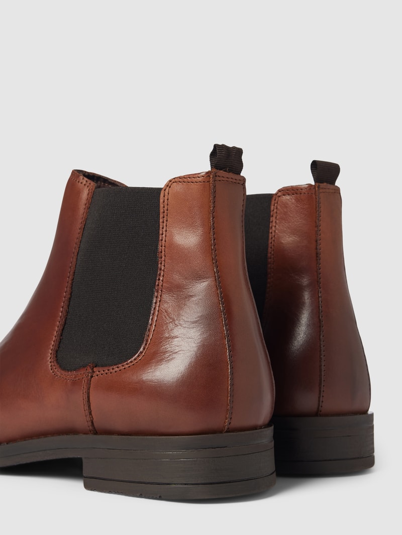 Ankle-Boots mit strukturierter Sohle in cognac