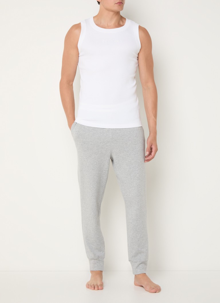 Pantaloni de trening slim fit de la Calvin Klein, cu logo în dungi.