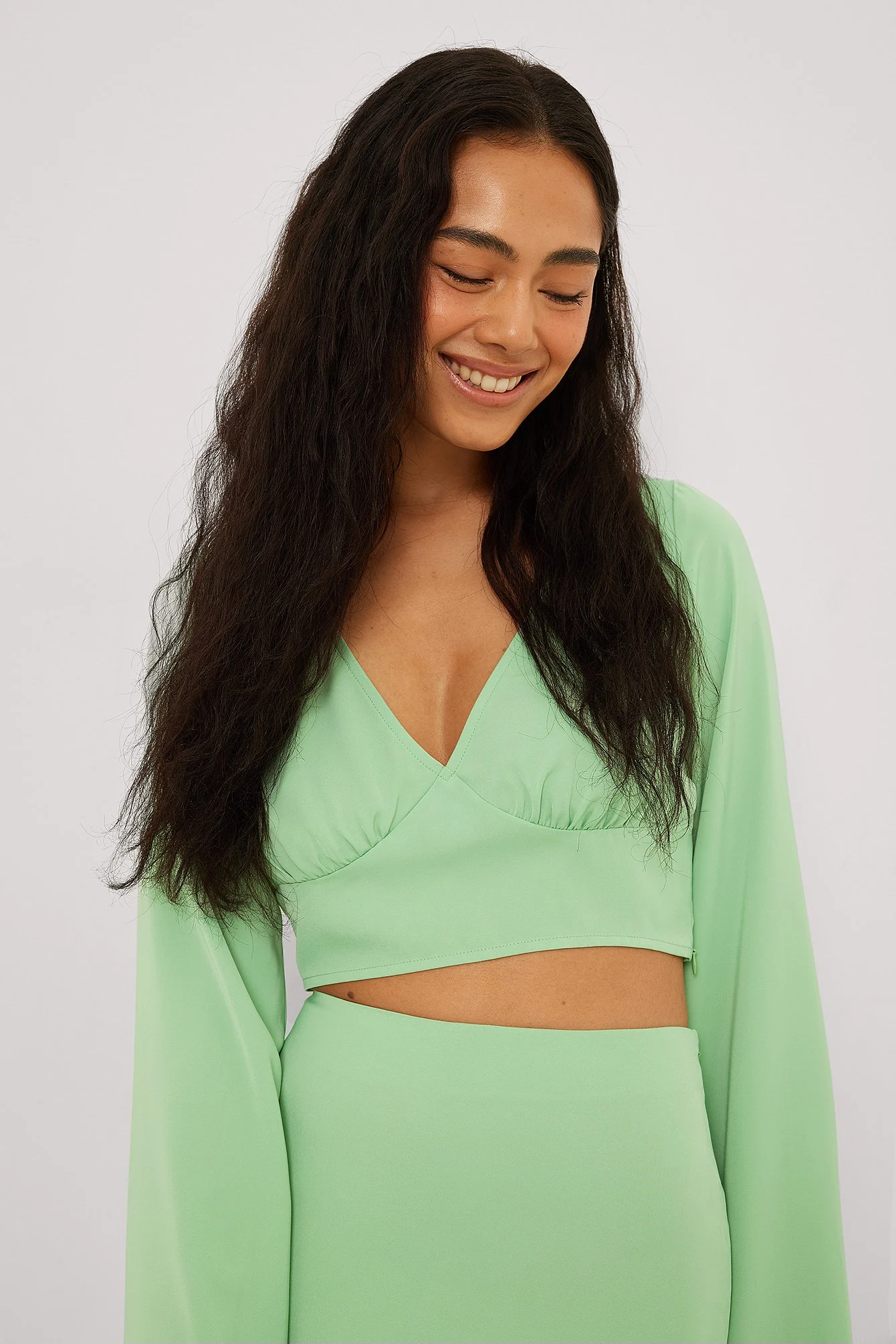 Bluse mit tiefem V-Ausschnitt