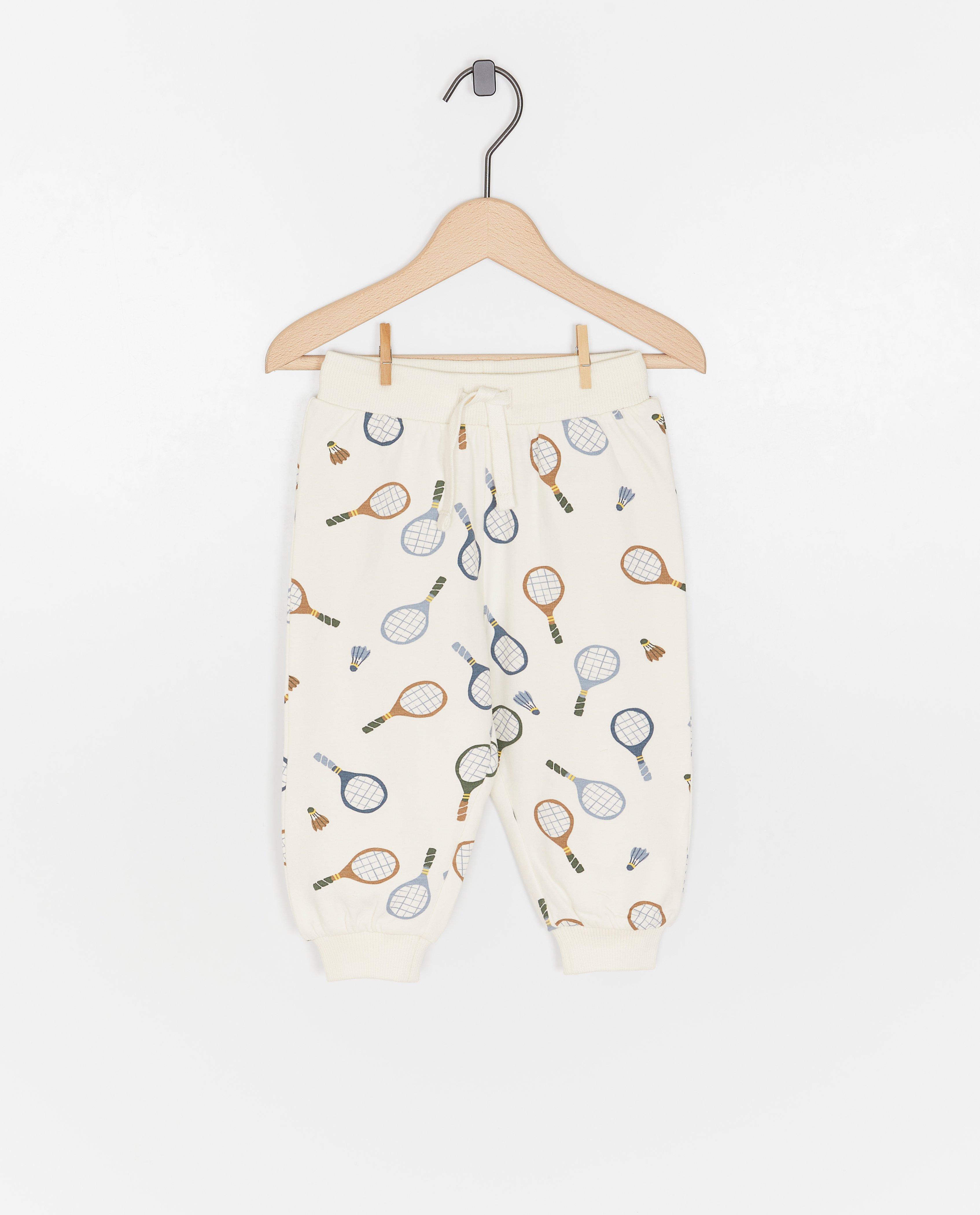 Pantaloni de trening Cuddles and Smiles cu imprimeu de rachete, albi