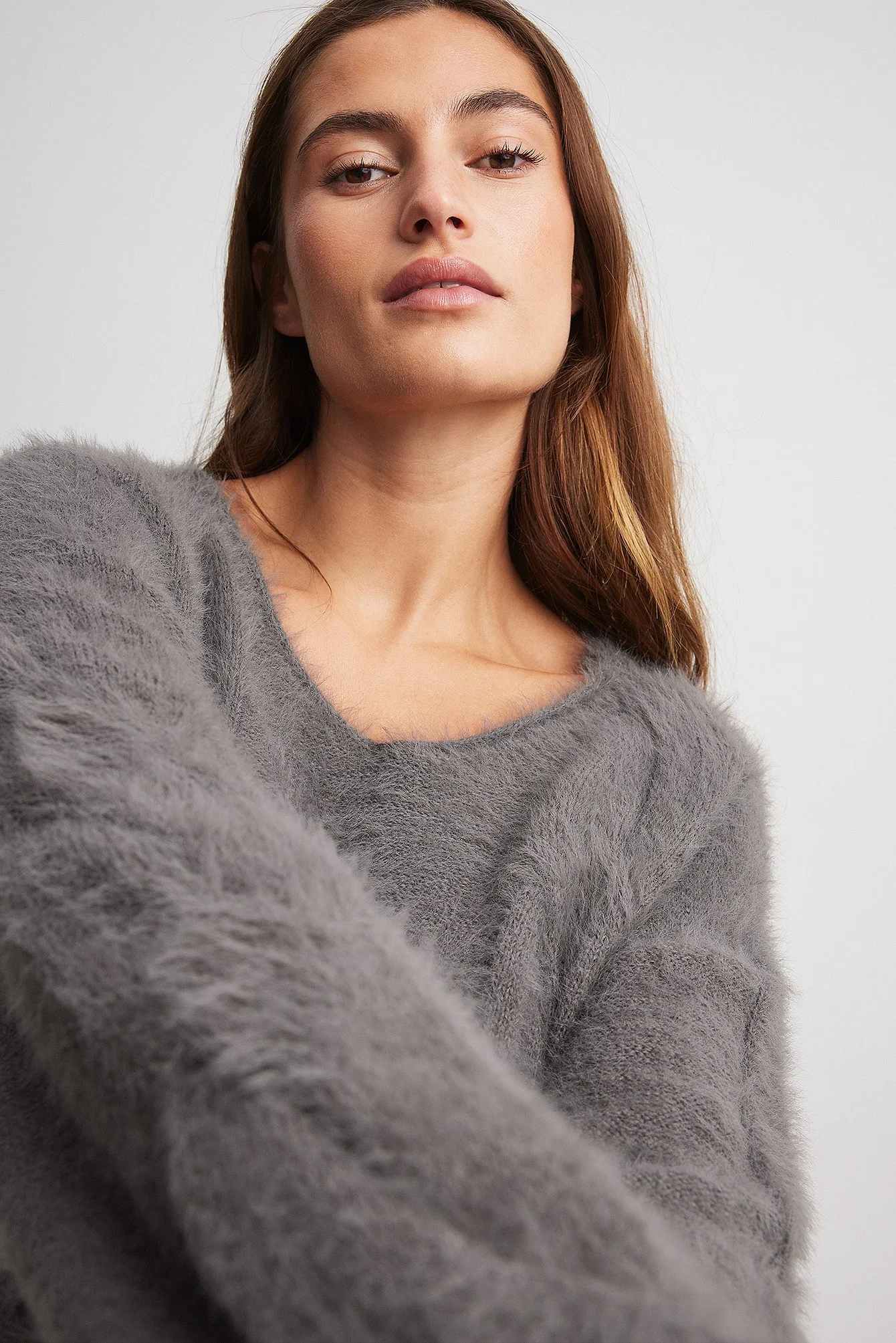 Strickpullover mit Zopfmuster und V-Ausschnitt