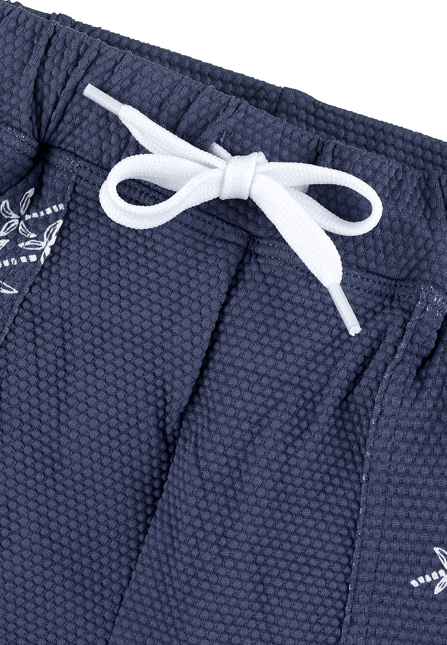 Kinder Badeshorts bedruckt mit Palmen in blau