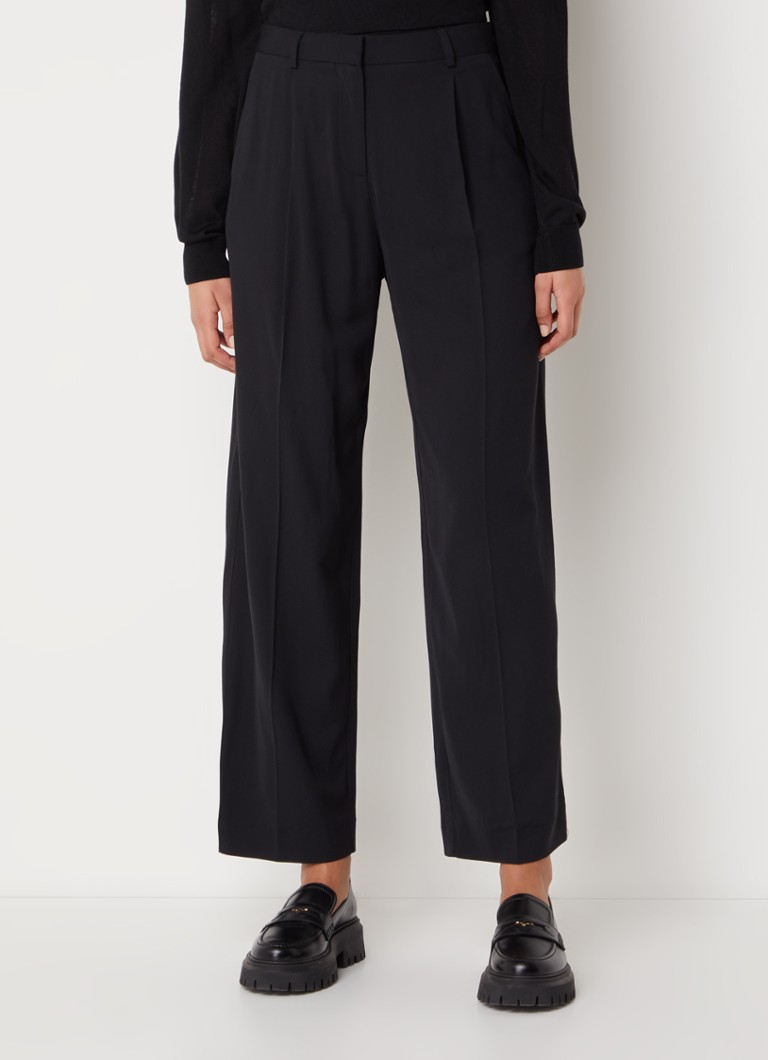 Pantaloni Gona de la ba&sh cu talie înaltă și croială lată, cu talie evazată la bază.