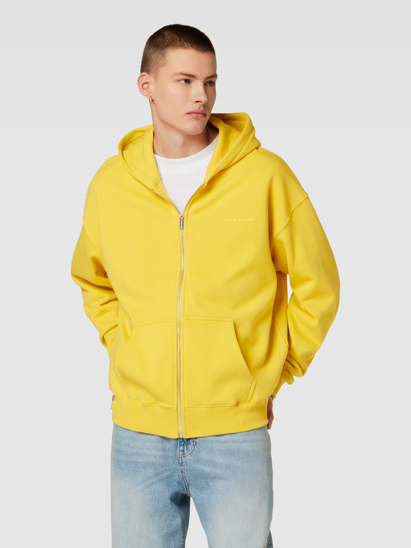 Sweatjacke mit seitlichen Eingrifftaschen in gelb