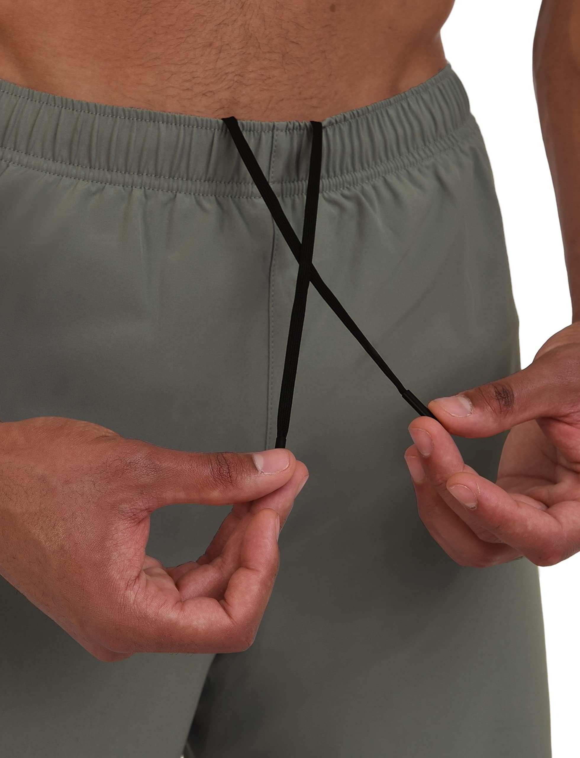TCA Trainingsshorts TCA Herren 2-in-1 Laufhose mit Kompressionshose - Grün/Grün, XL