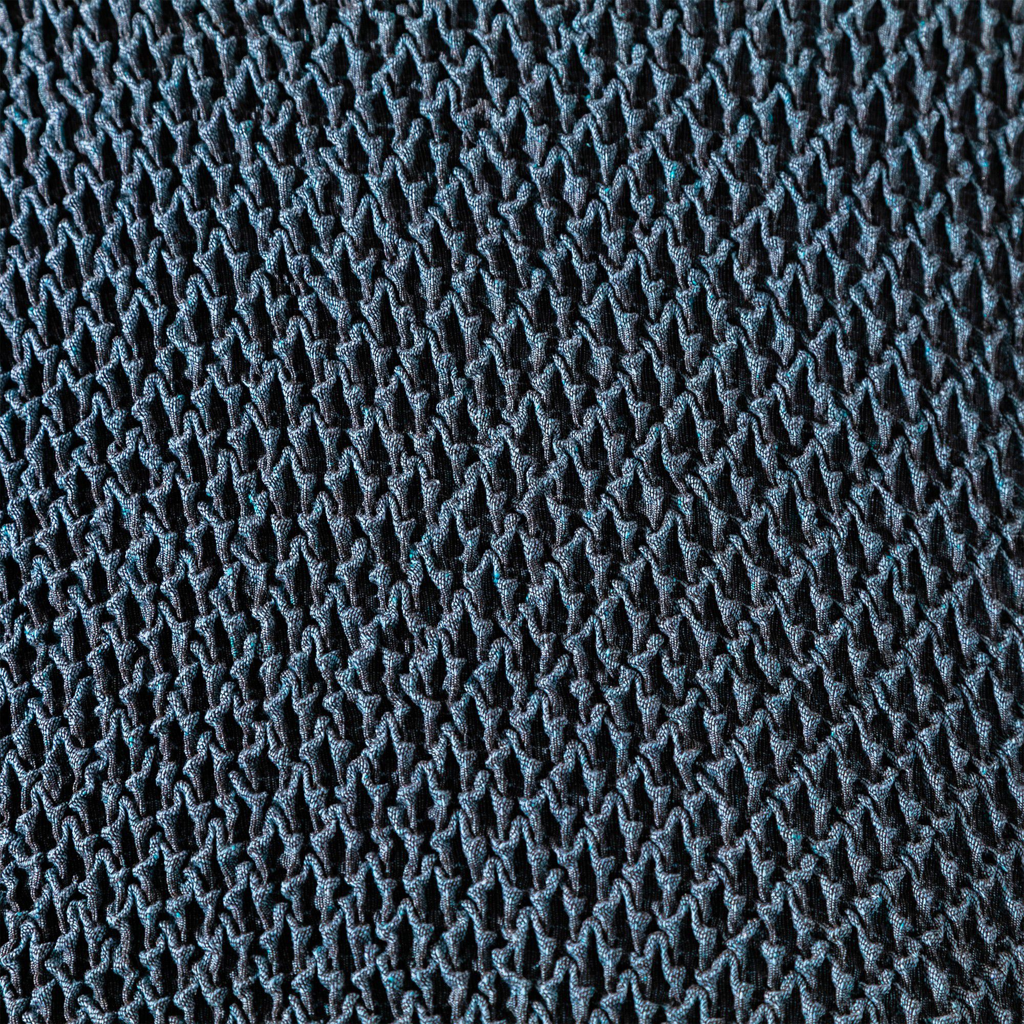 Housse texturée bi-extensible spéciale canapé fauteuil à accoudoirs