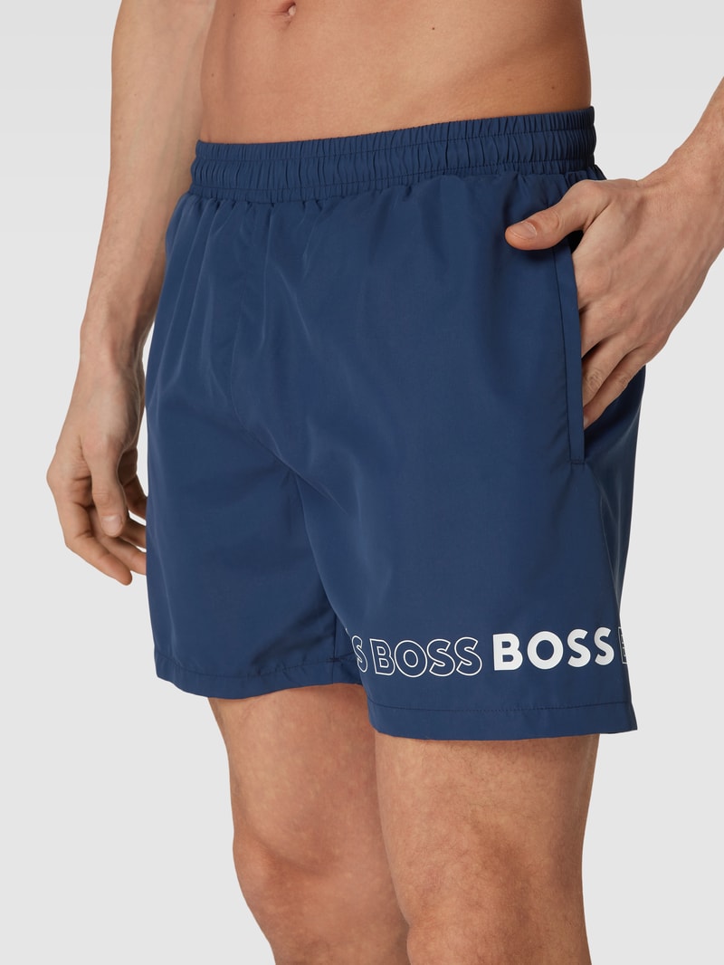 Badeshorts mit Label-Druck Modell 'Dolphin' in dunkelblau