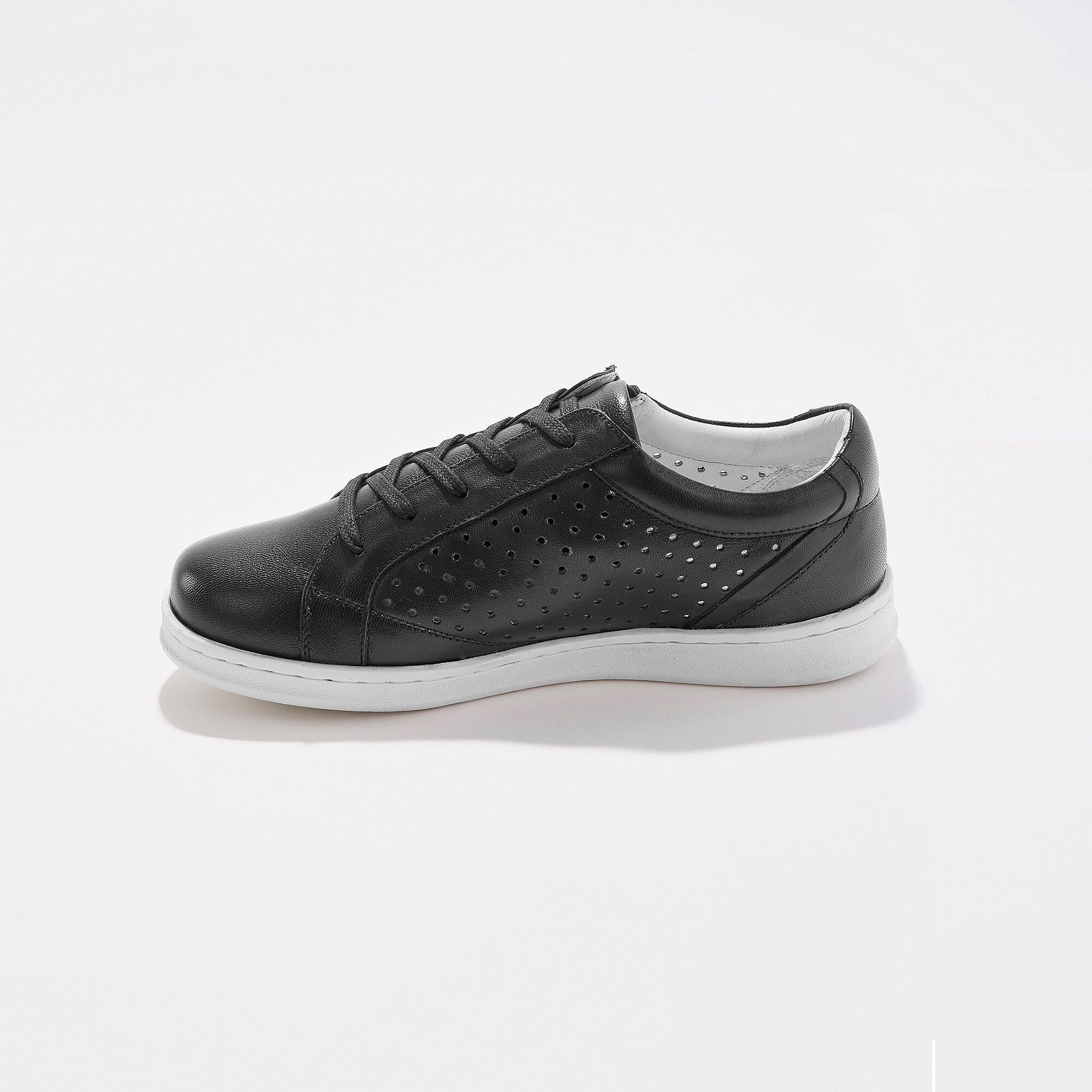 Tennis zippée en cuir perforé