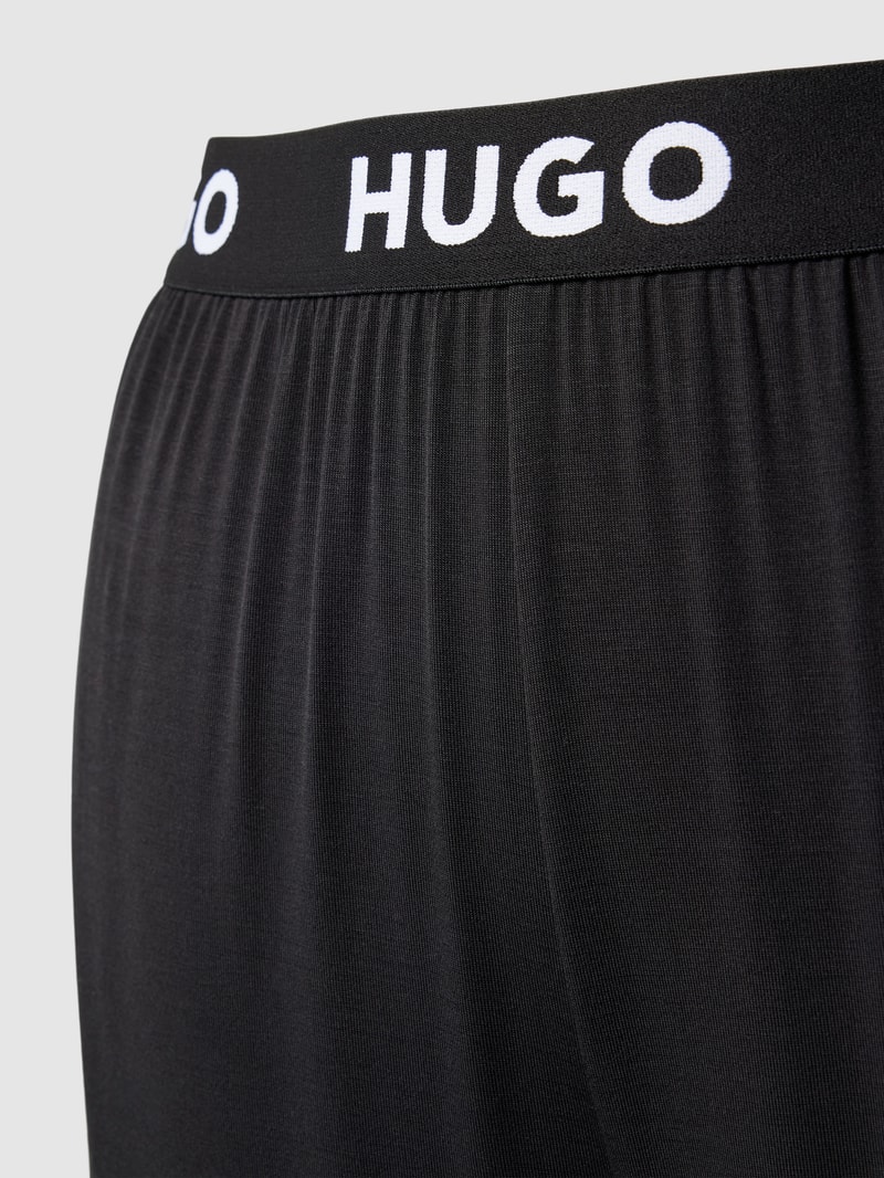 Sweatpants mit elastischem Logo-Bund Modell 'UNITE' in schwarz