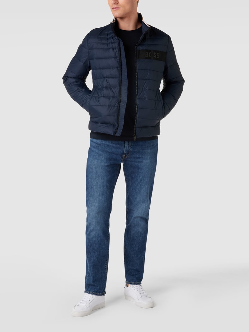 Steppjacke mit Label-Patch Modell 'Darolus' in dunkelblau