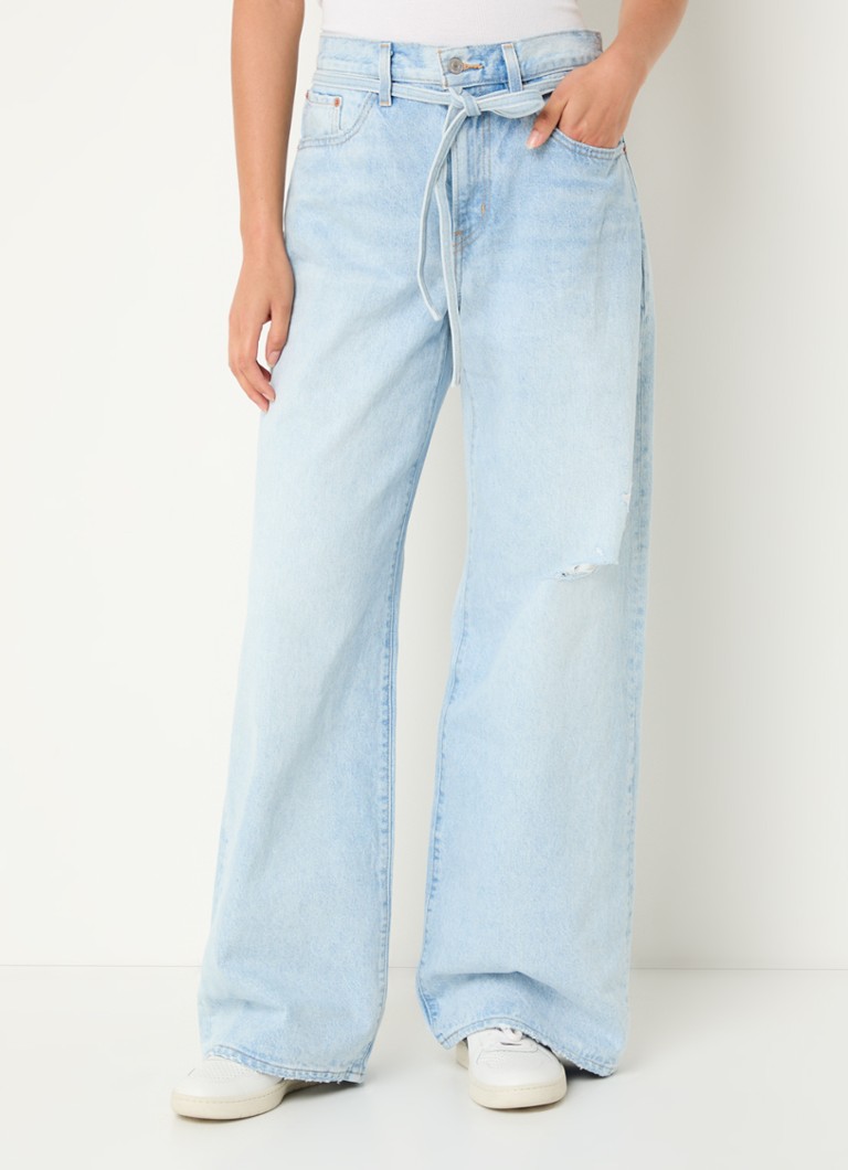 Levi's High waist wide leg jeans with light wash and tie belt