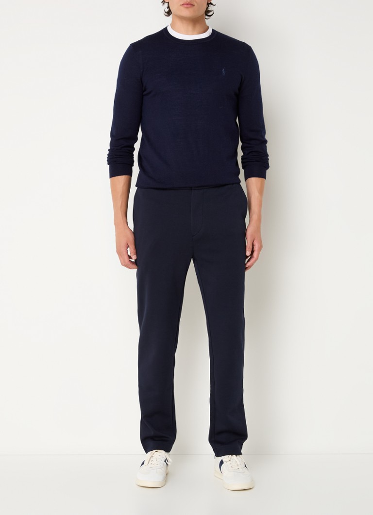 Pantaloni chino slim fit de la Ralph Lauren, cu șnur în talie și buzunare cu fermoar.