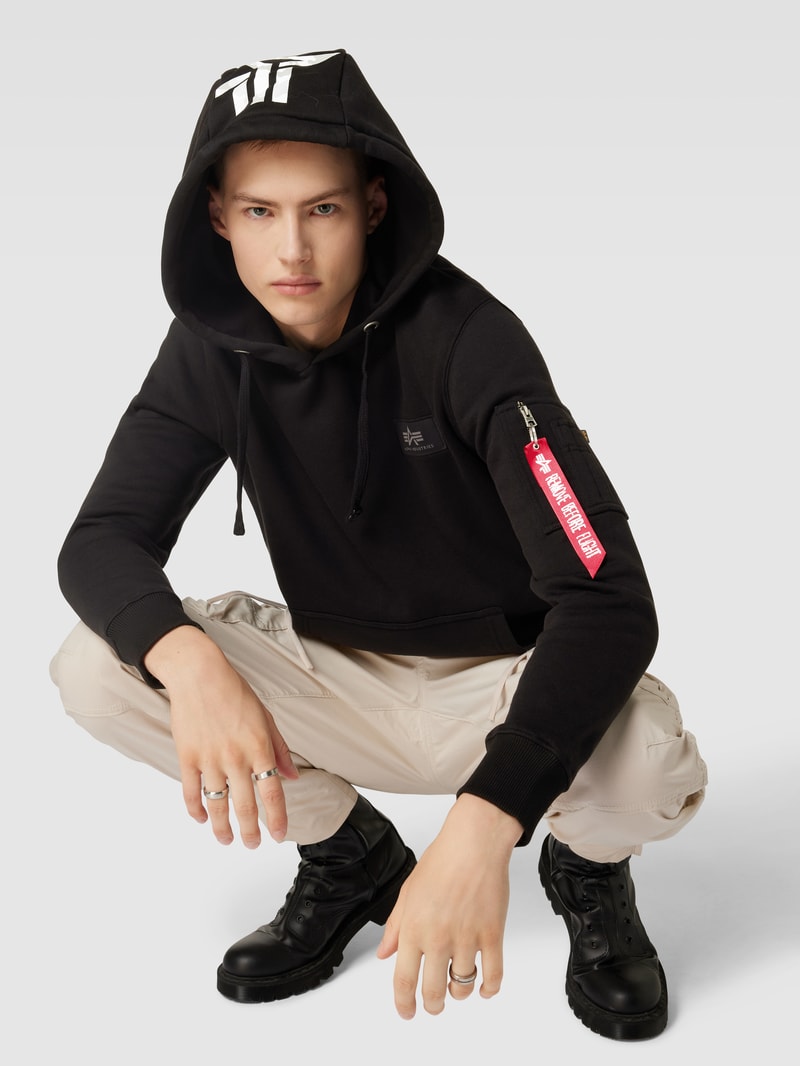 Hoodie mit Label-Applikation Modell 'Camo' in schwarz