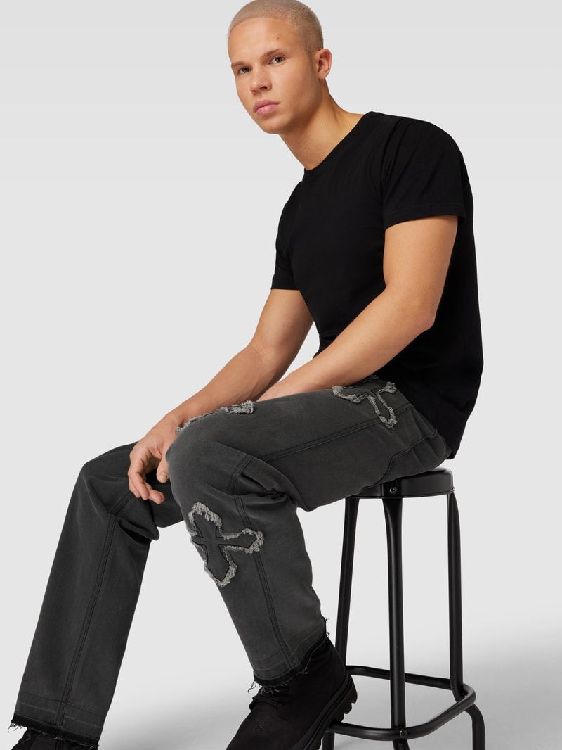 Jeans im Destroyed-Look mit Label-Stitching in black