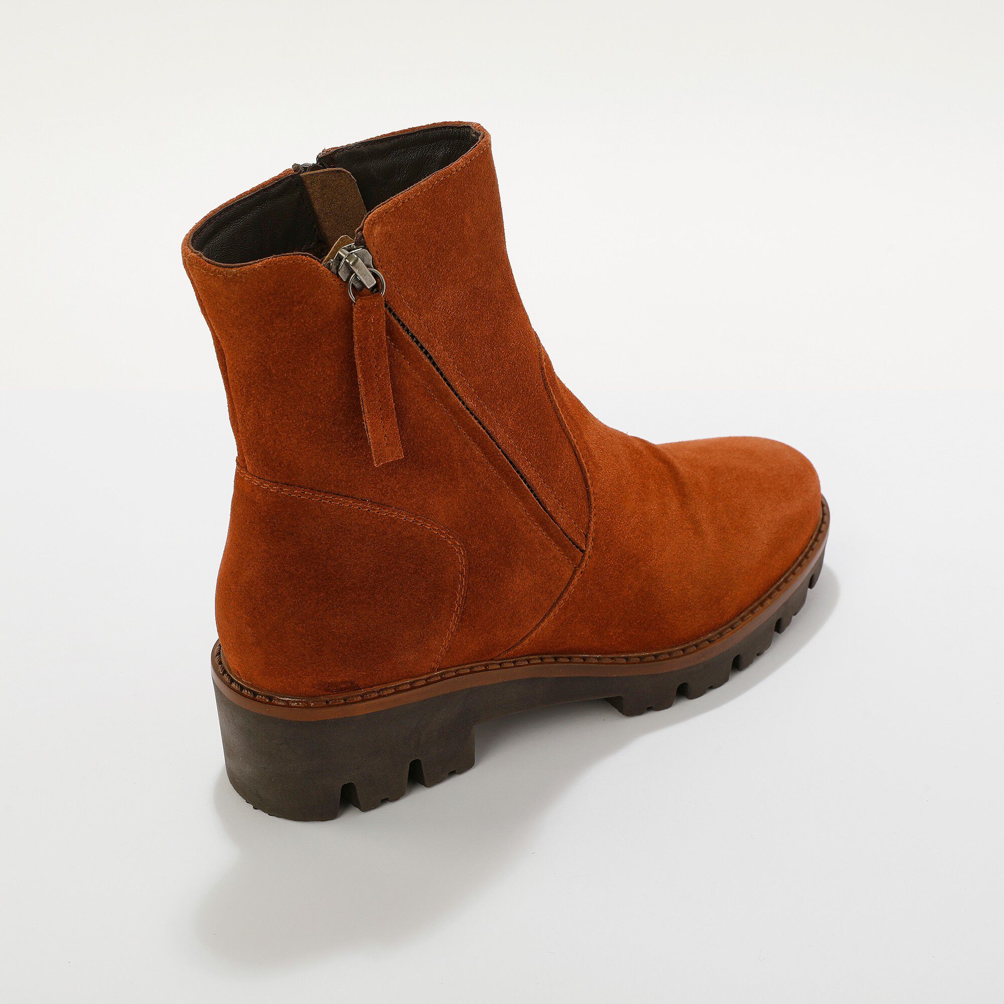 Boots zippées en cuir doublées, semelle crantée