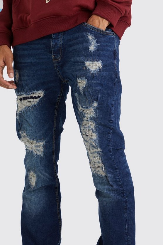 Slim-Fit Schlagjeans mit Rissen