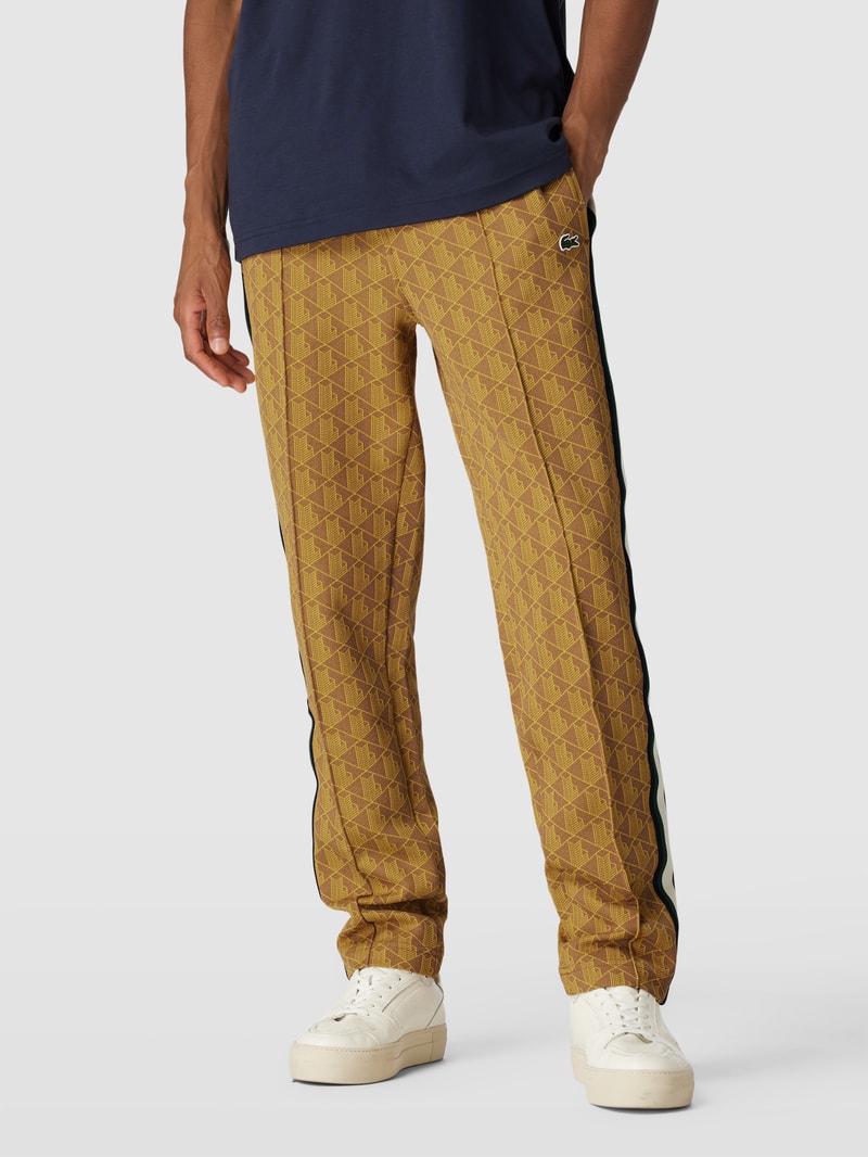 Regular Fit Sweatpants mit Allover-Muster und Galonstreifen in gelb