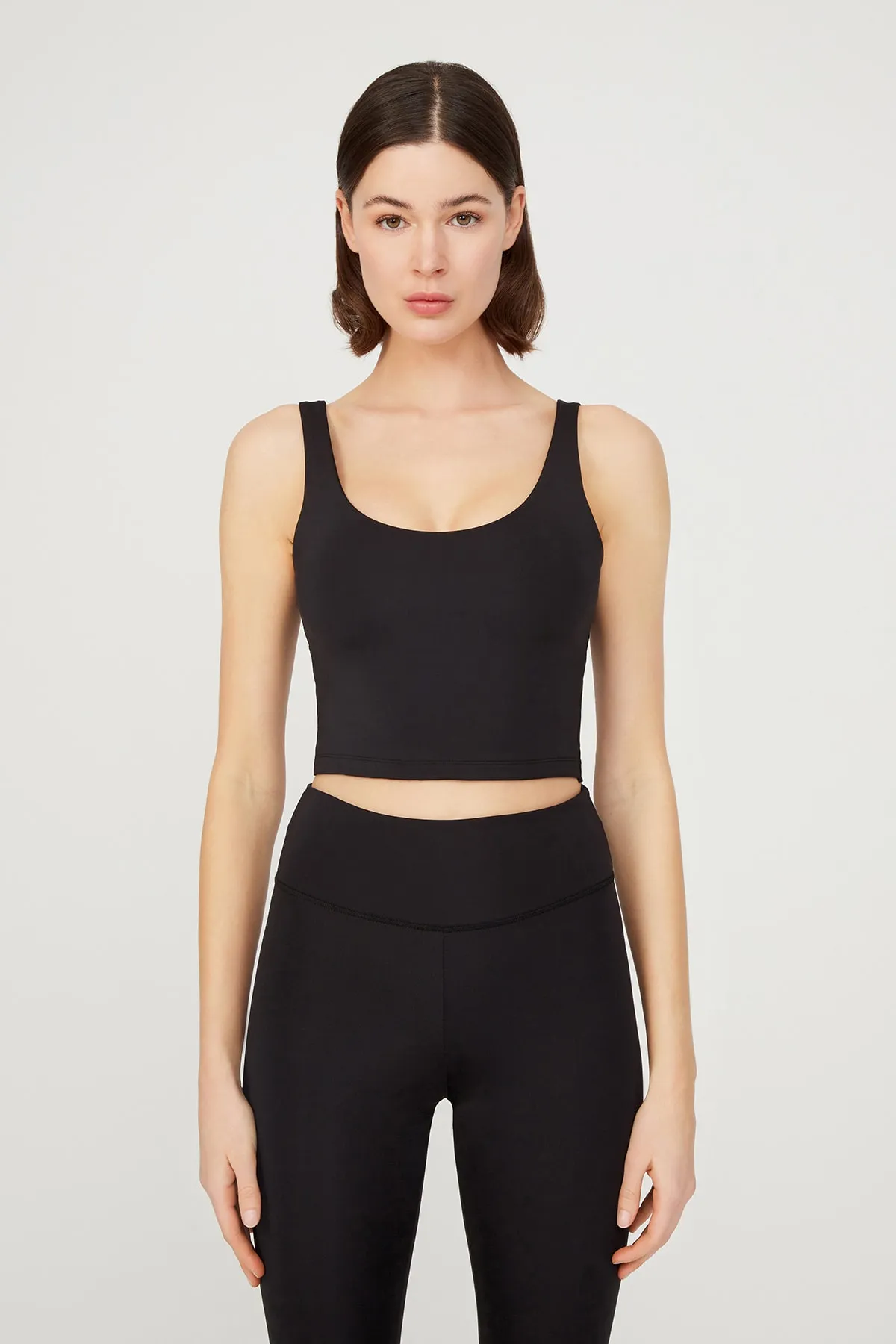 LOS OJOS  Schwarzes, leicht unterstütztes Bustier-Crop-Top mit Ausschnitt am Rücken