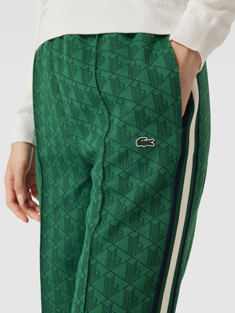 Sweatpants mit Label-Patch in grasgrün