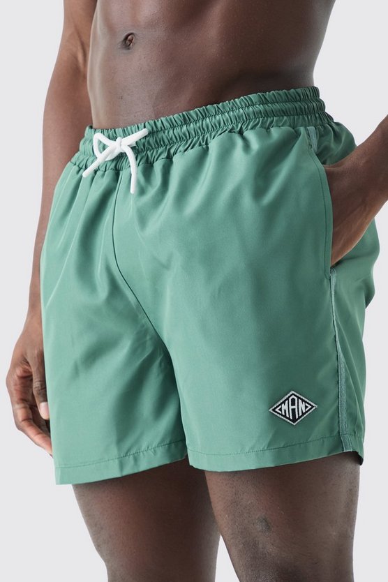 Kurze Man Badehose mit Paspeln