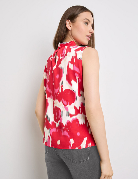 Ärmellose Bluse mit Alloverprint