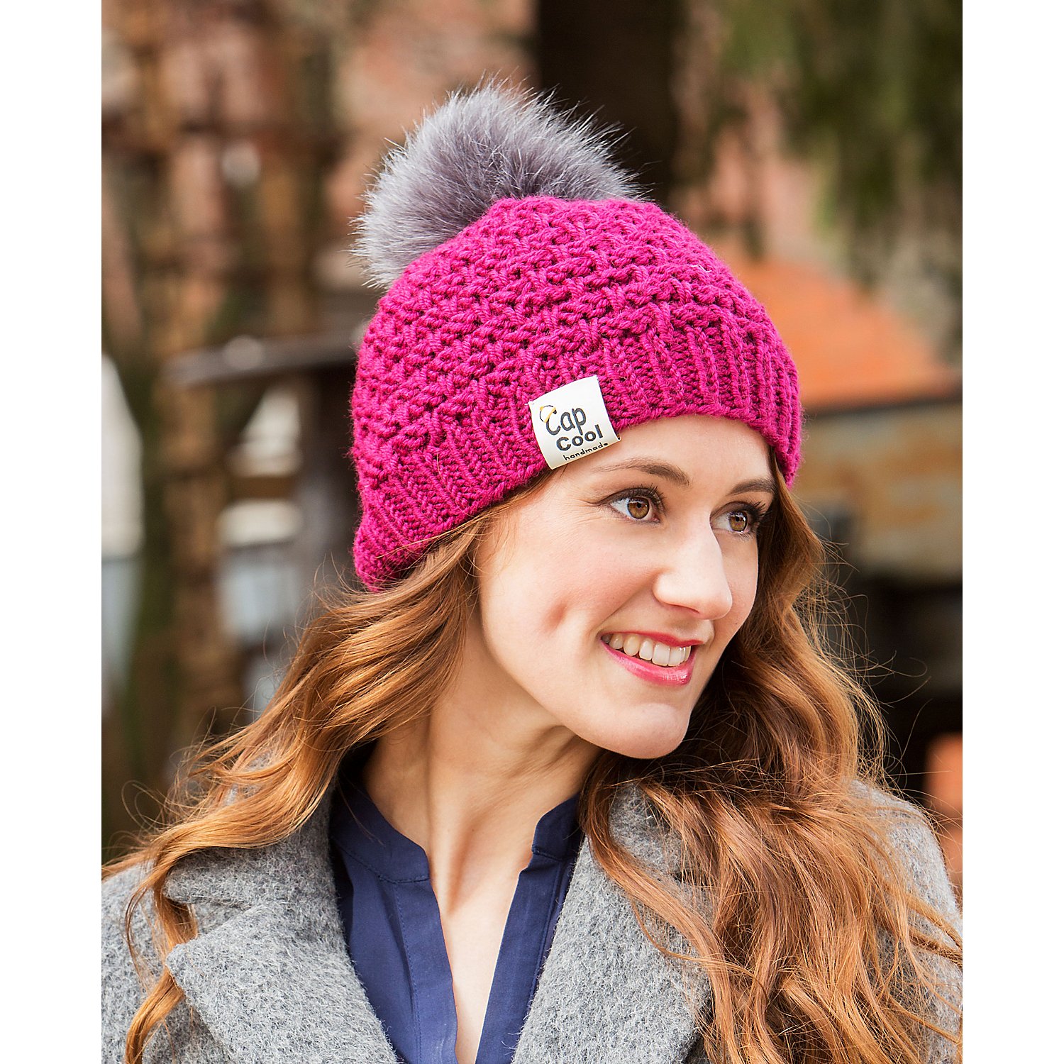 buttinette Fellimitat-Bommel, grau, Größe: 12 cm Ø